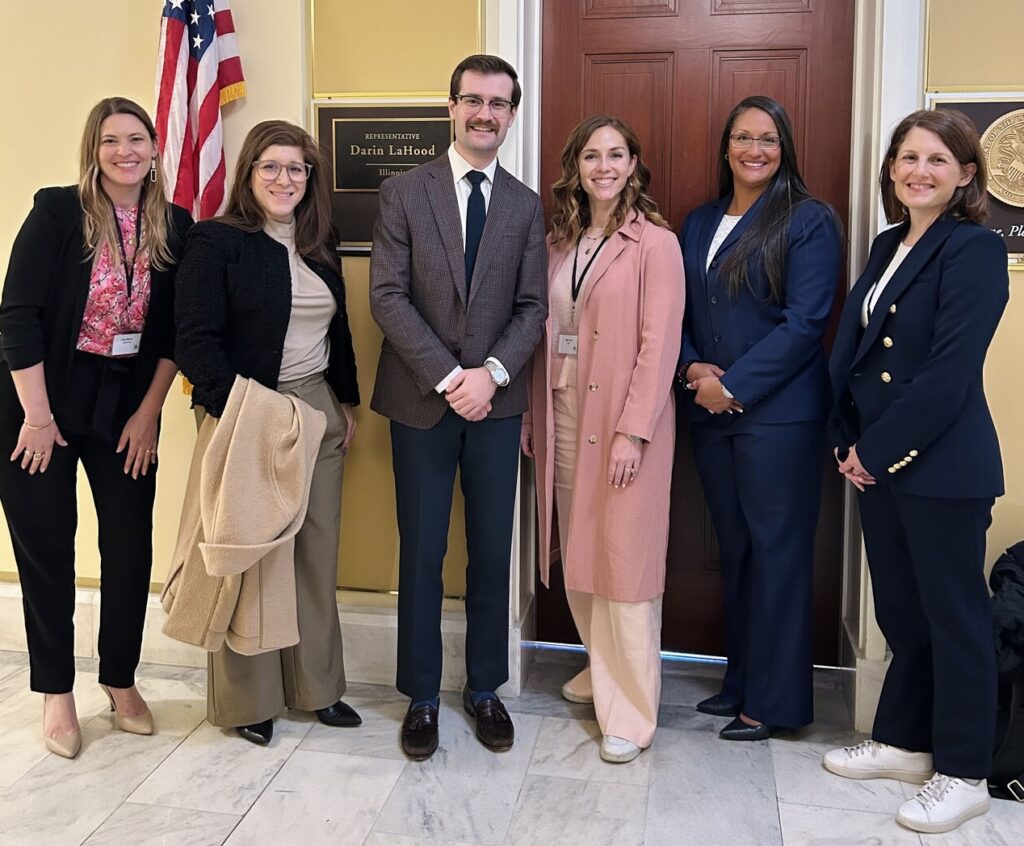 Allie Mahler with Illinois State Representative and other childcare advocates