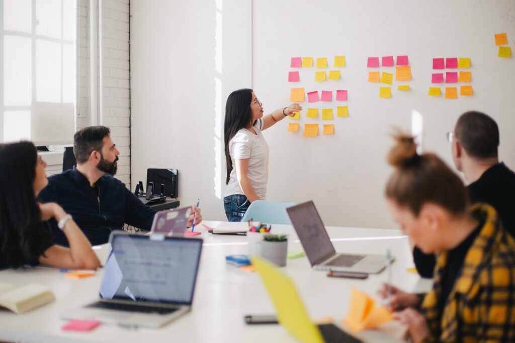 Workers at a company against a white background