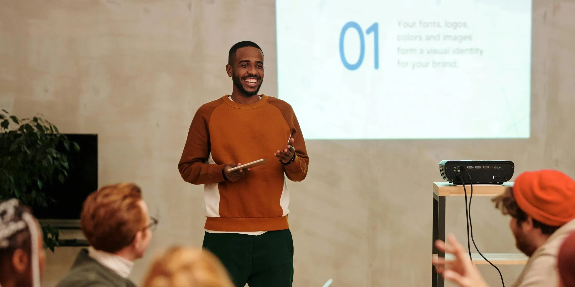 Coworkers watching a slideshow deck